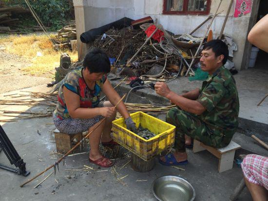 姚传军是当地人尽皆知的“捕鱼达人” 叶露茜摄