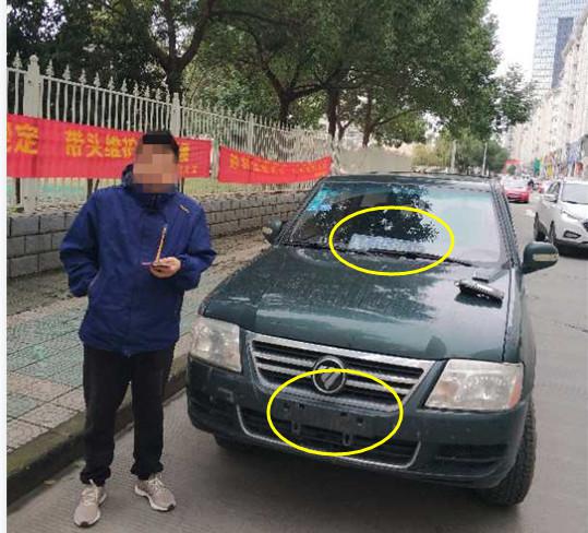 车牌飞到车窗里 杭州1男子这样挂车牌被扣12分