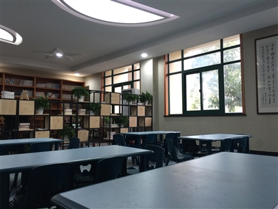 本版图片为资料照片 由区教育局提供 利用校阅览室等资源开展学后托管