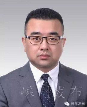 谢 岗