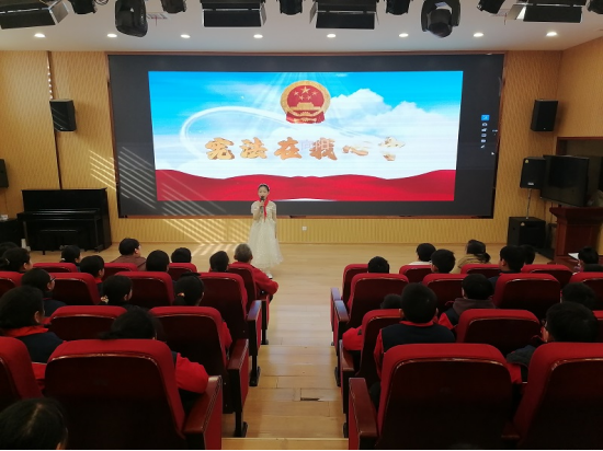 朵朵红花向阳开亳州市州东中心小学开展思想品德教育活动