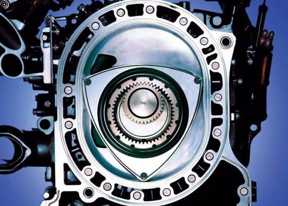 engine/rotary engine)由德国人felix wankel发明,这种发动机采用三角