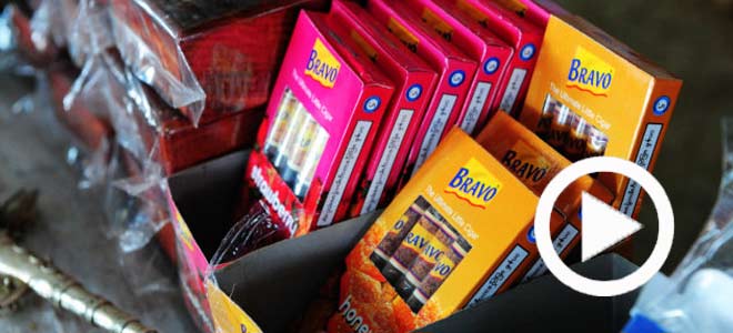 Going抽6块钱50根的手工雪茄 吃油条泡奶茶