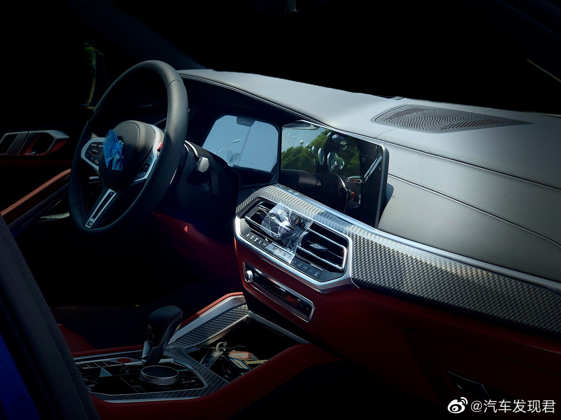 好看的汽车图片：宝马 X6 M 滨海湾蓝萨基尔橙