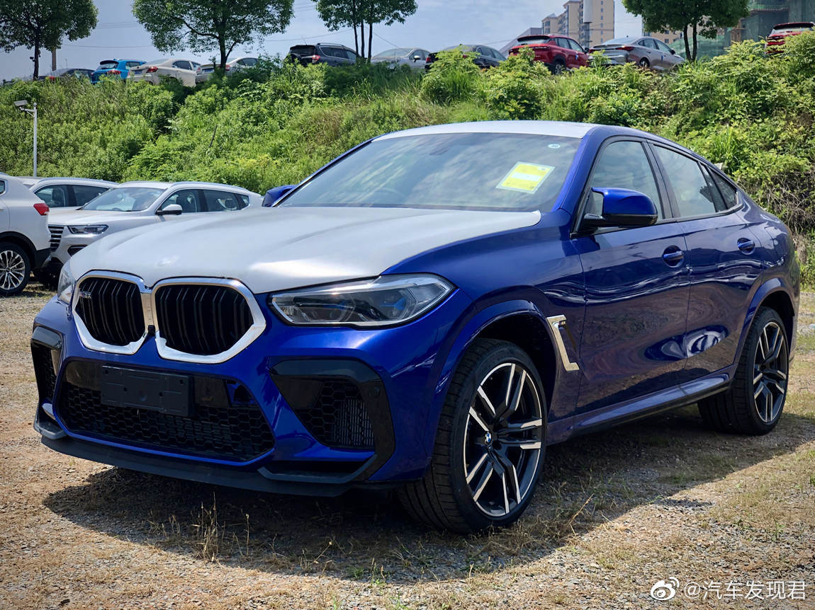 好看的汽车图片：宝马 X6 M 滨海湾蓝萨基尔橙