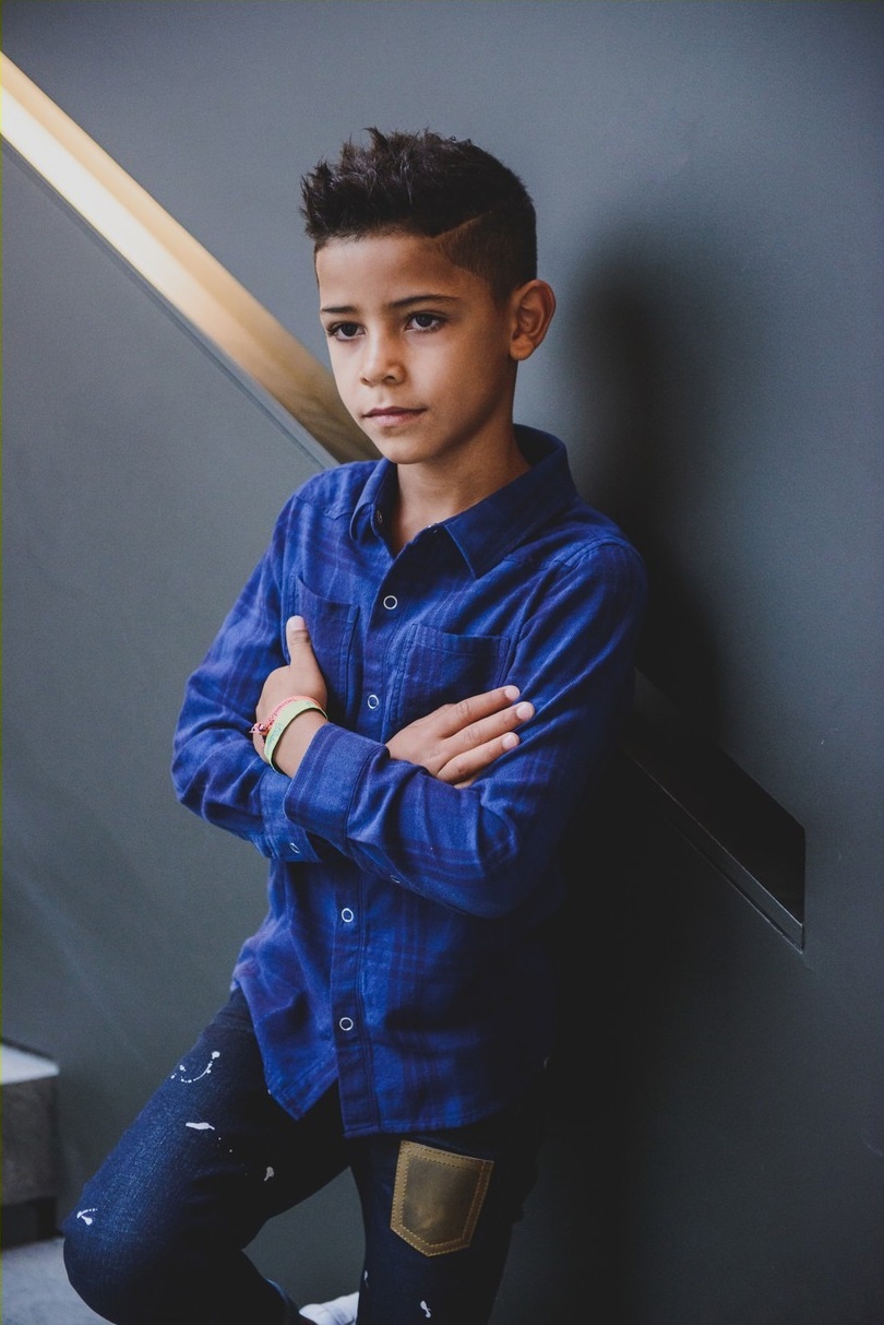 足坛巨星携儿子拍写真