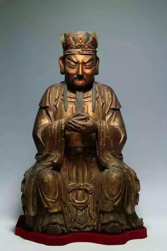 从服饰衣纹看不同时期木造像的特点