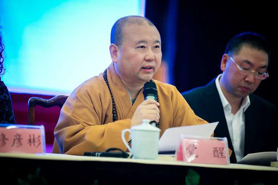 中国佛教协会副会长,上海玉佛禅寺方丈觉醒法师出席开幕式并致辞