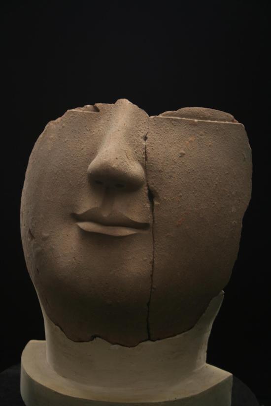 微博人气文物榜评选洛阳博物馆馆藏泥塑佛面像