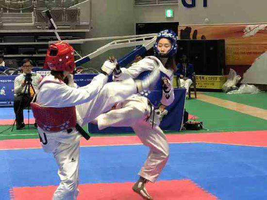 代表中国大学生出征跆拳道锦标赛西南大学夺4金