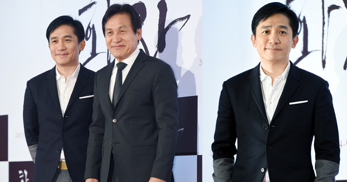 梁朝伟赴韩力挺安圣基新片 抿嘴浅笑