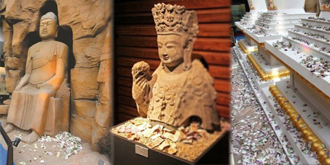 游客狂砸钱:景区文物成功德箱