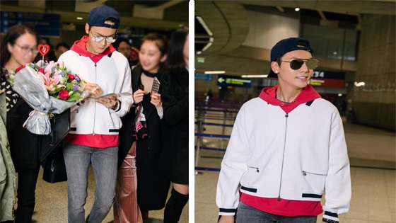 陈伟霆抵达巴黎机场造型率性