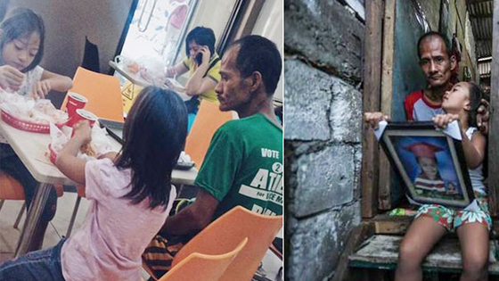 父亲看着女儿吃炸鸡自己挨饿