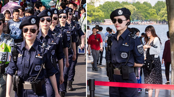 西湖游客爆满 美女城管吸睛