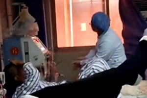 实拍病房窗外燃起熊熊大火 医生淡定救治