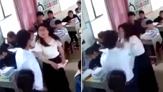 监拍：男生遭女老师扇耳光 当场猛扇回去
