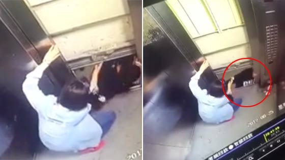 一家三口遇电梯故障卡26楼 丈夫爬出瞬间坠亡