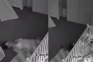 好吓人！妈妈被拉进婴儿床下 双眼直盯监视器