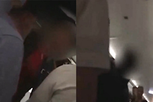 醉酒女子疯狂辱骂还躺过道 被赶下飞机引发欢呼