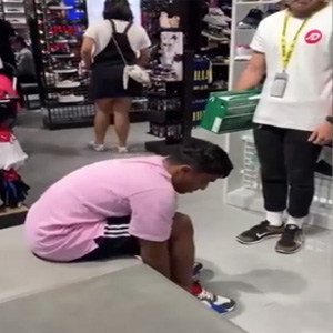 澳顾客试穿运动鞋飞奔店外 店员穷追不舍