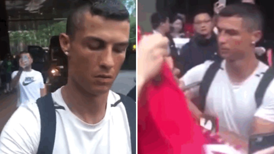 神速签名！C罗抵达北京为粉丝签名一秒一个