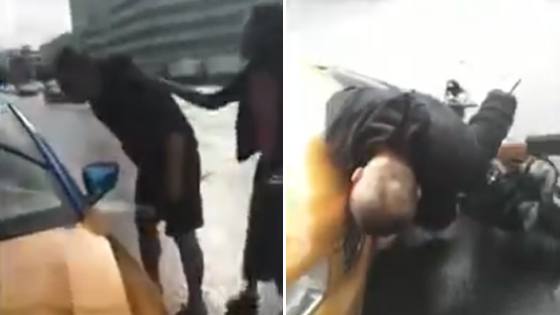 摩托车司机与的哥争吵 心脏病发倒在车前