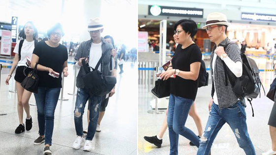 李咏最后一次与妻子同框机场照