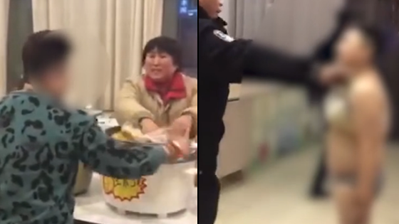 奔驰女脱衣追打围观者：我是精神病，我有证！