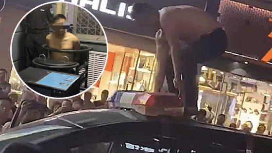 男子酒后欲吃霸王餐  砸警车打民警当街撒尿被刑拘