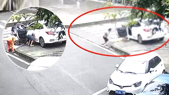 新手司机停车忘拉手刹 车子溜坡自己惨遭碾压