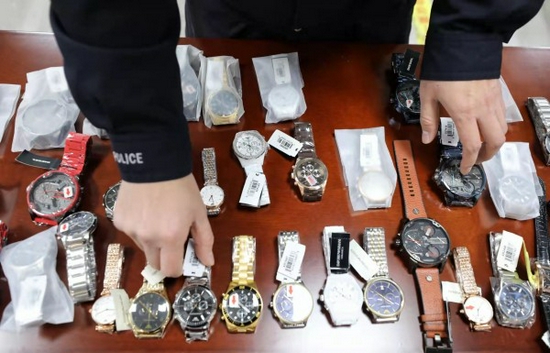 上海警方破获1800万低价高仿品牌表案