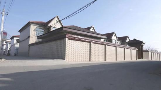 黄继宗一家居住的联排别墅外景(资料图片)