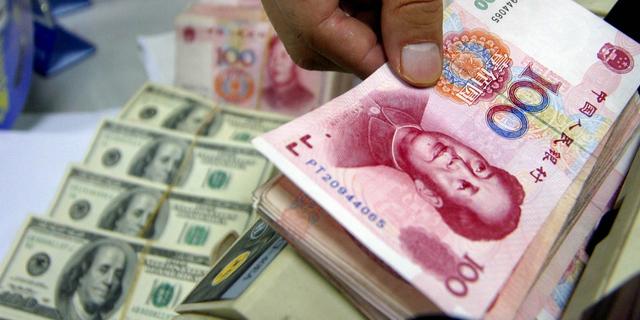 离岸人民币刺破6.96关口 专家：没必要对短期贬值过度担心