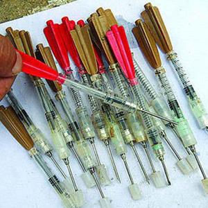 射毒针偷狗却射中孕妇致一尸两命