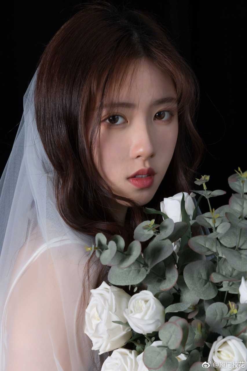 组图:浙江越秀外国语学院校花 婚纱照仙气十足