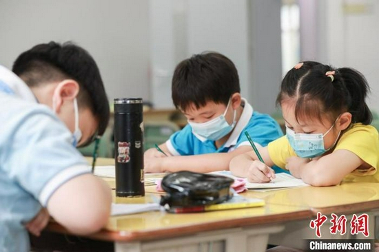 资料图:北京开展暑期学生托管服务。中新社记者 贾天勇摄