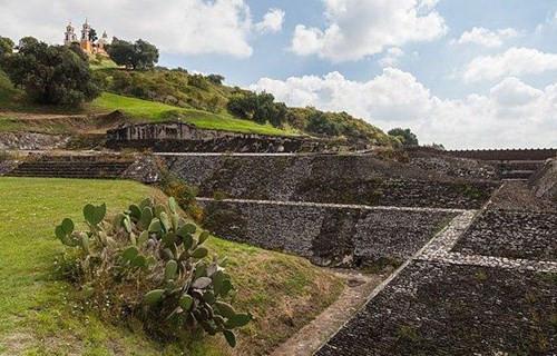 go to puebla, mexico and look for a giant hill with a church on