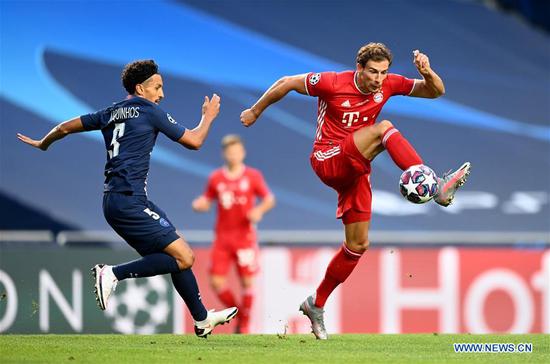 Leon Goretzka (R) of FC Bayern Munich controls the ball under pressure from Marquinhos of Paris Saint-Germain during the UEFA Champions League Final match between Paris Saint-Germain and Bayern Munich at Estadio do Sport Lisboa e Benfica in Lisbon, Portugal, Aug. 23, 2020. (Photo by Michael Regan/UEFA via Xinhua)