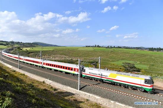 A train runs on the Ethiopia-Djibouti railway during an operational test near Addis Ababa, Ethiopia, on Oct. 3, 2016. (Xinhua/Sun Ruibo)