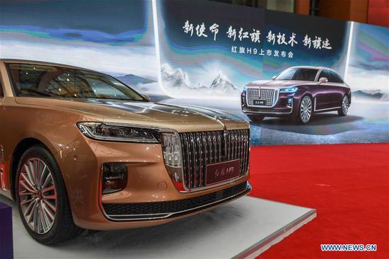 Hongqi H9, a new vehicle model of First Automotive Works (FAW) Group Co., Ltd., is exhibited during its launch ceremony in Changchun, northeast China's Jilin Province, Aug. 23, 2020. The Hongqi H9 model is priced at a range of 309,800 yuan (44,797 U.S. dollars) to 539.800 yuan (78,055 U.S. dollars). (Xinhua/Zhang Nan)