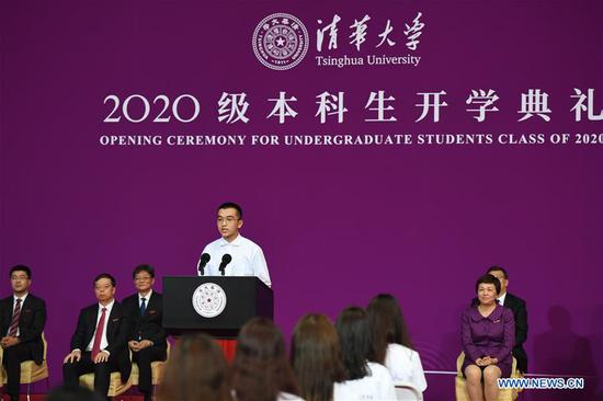 Liu Qirui, a freshman representative, addresses the opening ceremony for undergraduate students class of 2020 in a stadium at Tsinghua University in Beijing, capital of China, Sept. 9, 2020. China's Tsinghua University held the online and offline opening ceremony for undergraduate students class of 2020 on Wednesday. (Xinhua/Ju Huanzong)