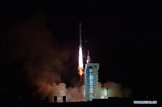 A Long March-4C rocket carrying Yaogan-33 satellite blasts off from the Jiuquan Satellite Launch Center in northwest China on Dec. 27, 2020. China sent a new remote sensing satellite into space from the Jiuquan Satellite Launch Center at 11:44 p.m. Sunday (Beijing Time). The satellite, Yaogan-33, entered the planned orbit successfully. The mission also sent a micro and nano technology experiment satellite into orbit. (Photo by Wang Jiangbo/Xinhua)