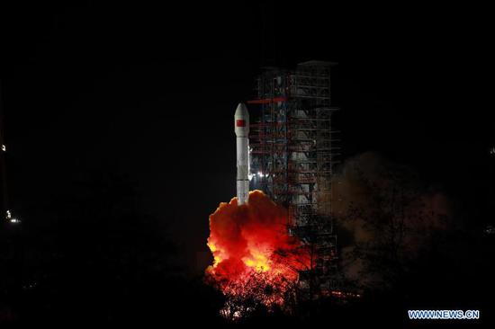 A Long March-3B carrier rocket carrying the Tiantong 1-03 satellite blasts off from the Xichang Satellite Launch Center in southwest China's Sichuan Province, Jan. 20, 2021. China successfully launched a new mobile telecommunication satellite from the Xichang Satellite Launch Center in southwest China's Sichuan Province on Wednesday. The Tiantong 1-03 satellite was launched at 00:25 a.m. (Beijing Time) by a Long March-3B carrier rocket and entered the planned orbit successfully. (Photo by Guo Wenbin/Xinhua)