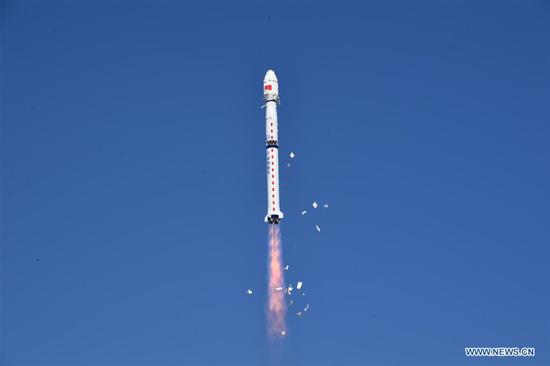 A Long March-4C rocket carrying Yaogan-34 satellite blasts off from the Jiuquan Satellite Launch Center in northwest China on April 30, 2021. China successfully sent a new remote sensing satellite, Yaogan-34, into space from the Jiuquan Satellite Launch Center in northwest China at 3:27 p.m. Friday (Beijing Time). The Yaogan-34 satellite was carried by a Long March-4C rocket and successfully entered its planned orbit. (Photo by Wang Jiangbo/Xinhua)
