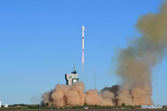 A Long March-4C rocket carrying the Fengyun-3E (FY-3E) satellite blasts off from the Jiuquan Satellite Launch Center in northwest China, July 5, 2021. China sent a new meteorological satellite into planned orbit from the Jiuquan Satellite Launch Center in northwest China on Monday morning. (Photo by Wang Jiangbo/Xinhua)