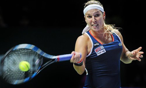 Dominika Cibulkova of Slovakia competes during the WTA Finals match against Angelique Kerber of Germany at Singapore Indoor Stadium, October 30, 2016. Cibulkova won 2-0. Photo: Xinhua
