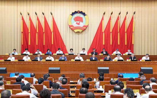 Top political advisor urges enhanced consultation on ...