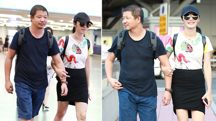 姚晨甜挽老公大方任拍 笑容灿烂美腿细长