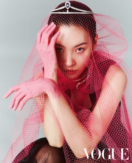 組圖：宣美登時尚雜誌拍大片 透視漁網裝曲線畢露